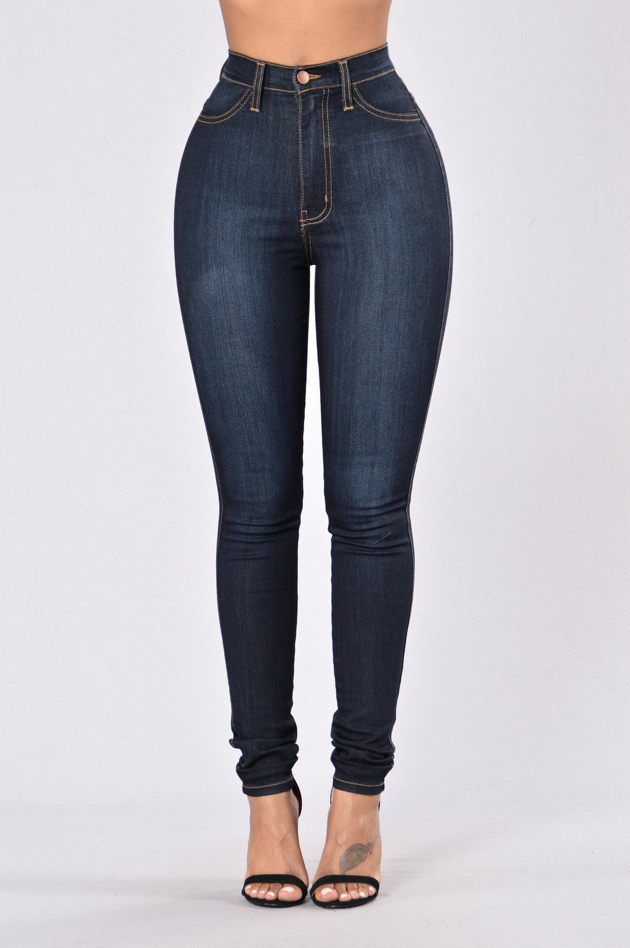 Pantalon slim en denim extensible, taille haute